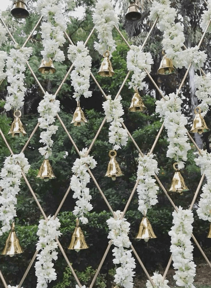 Jasmine garlands and golden bells on a diamond lattice